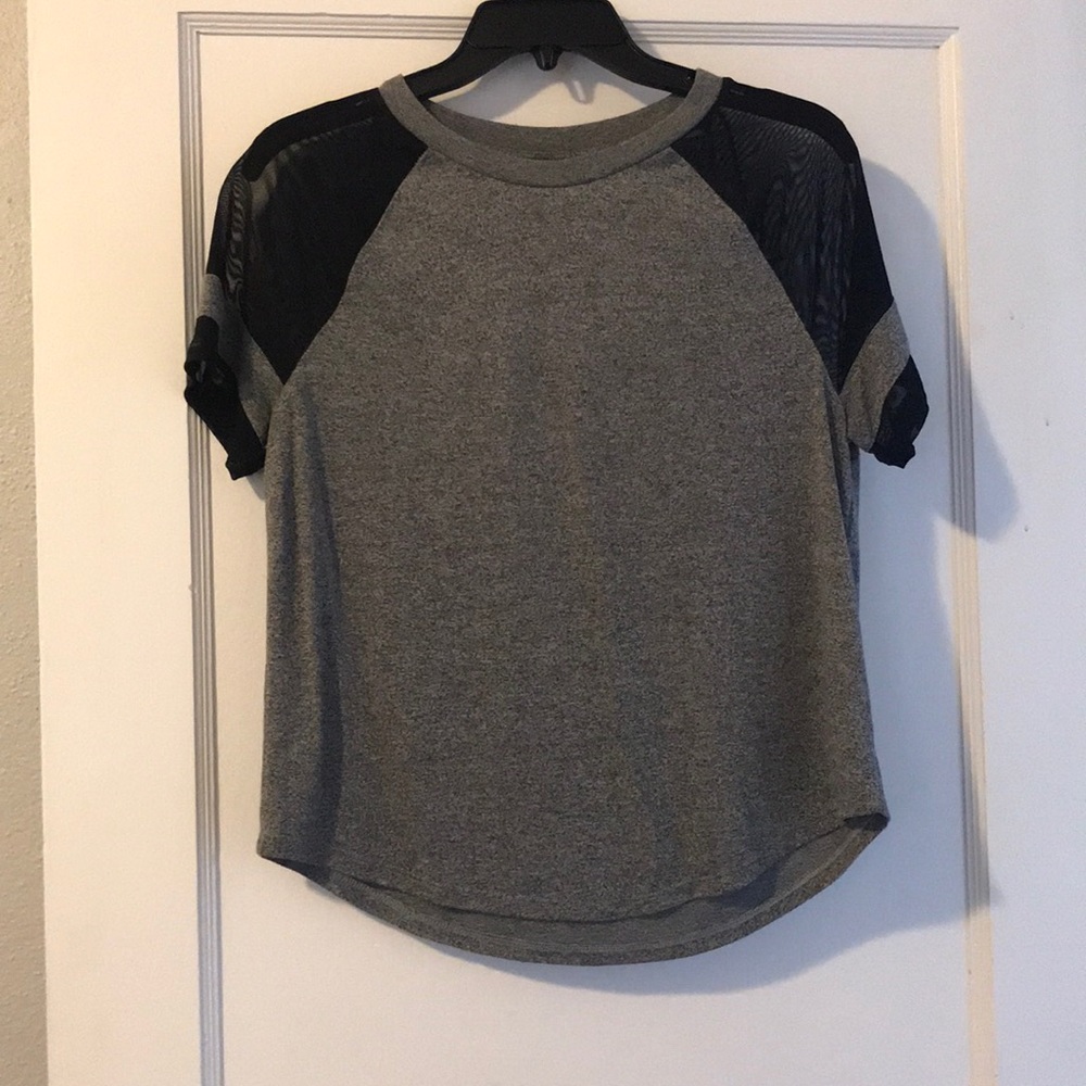 Cute “jersey” T-shirt with see through sleeves
